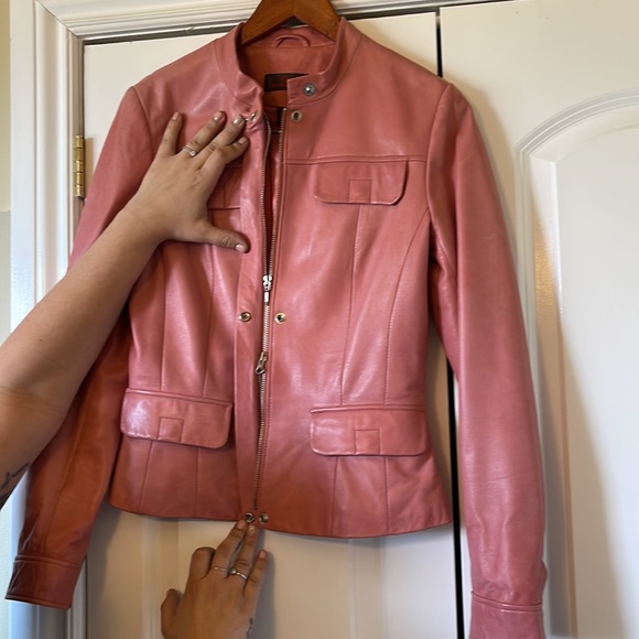 Danier pink leather jacket.  Lightly worn.    Marks as detailed in photos.  XS - Picture 2 of 9